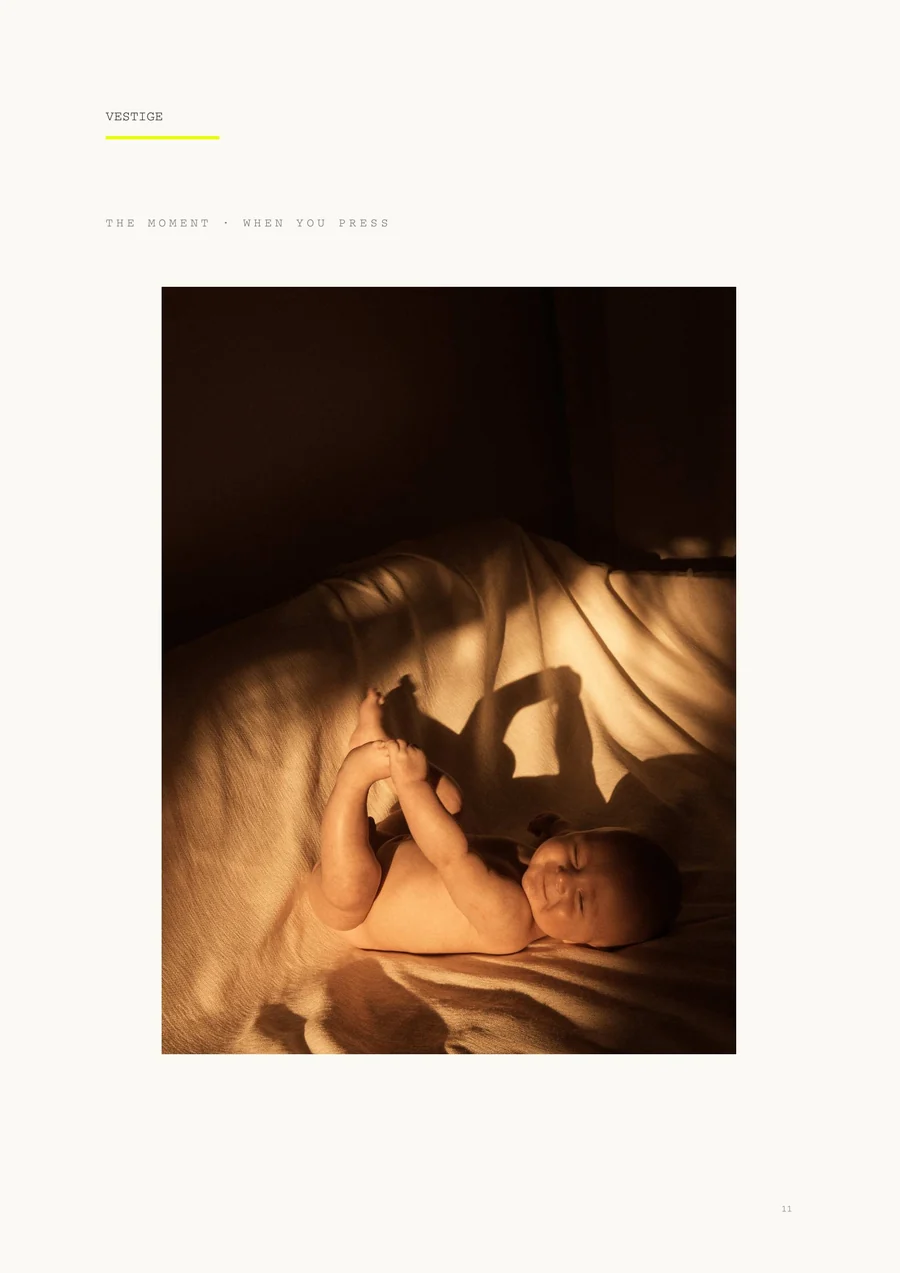 A page from the guide — a child asleep in afternoon light